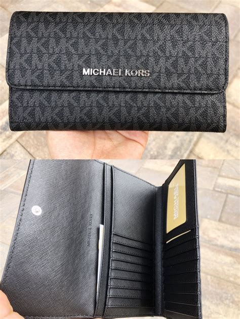 michael kors logo signature large black wallets|michael kors wallet with strap.